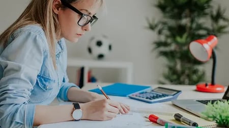 Woman studying at a desk