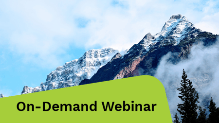 Scenic mountain landscape with snow-capped peak.