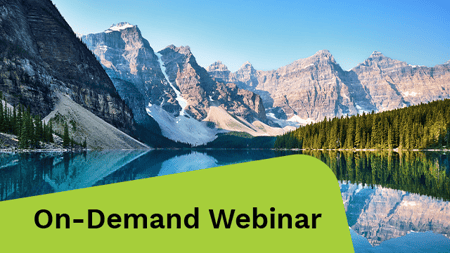 Scenery of a mountain with a deep blue lake flowing below.