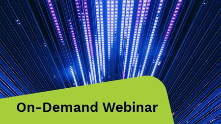 Bright blue and purple lights in a dark room.