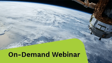 Earth viewed from space, showcasing swirling clouds and a vibrant atmosphere against the backdrop of the cosmos.